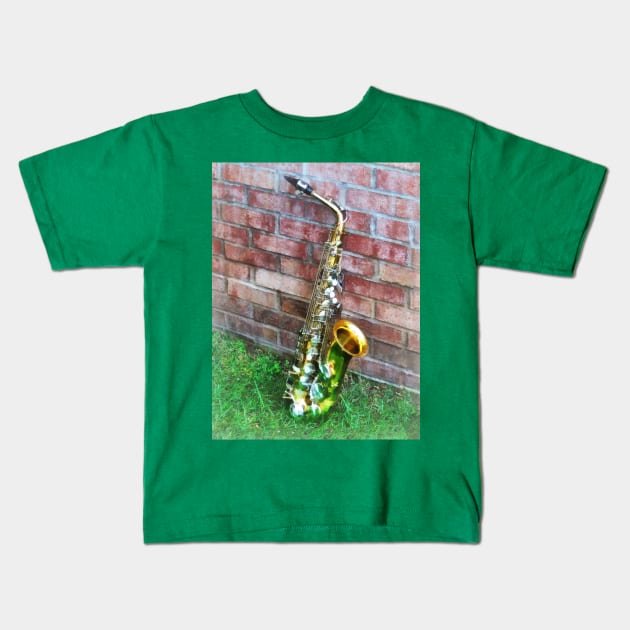 Music - Saxophone Against Brick Kids T-Shirt by SusanSavad